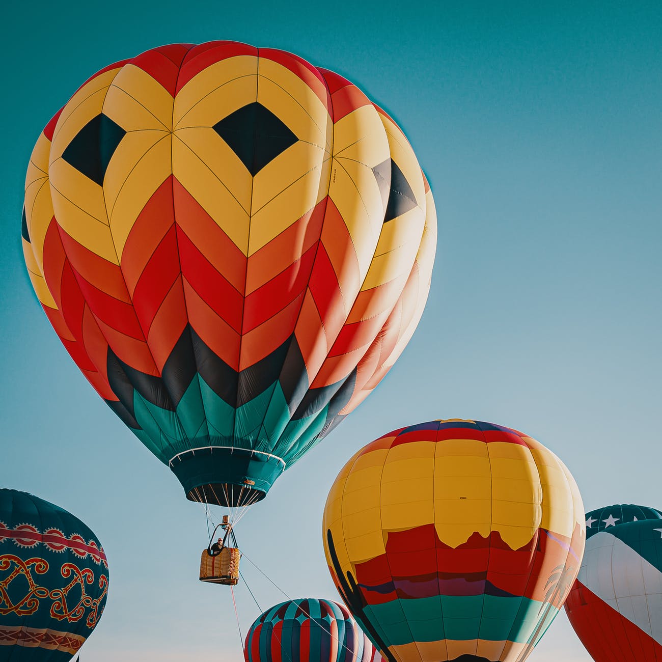 photo of multi coloured hot air balloons